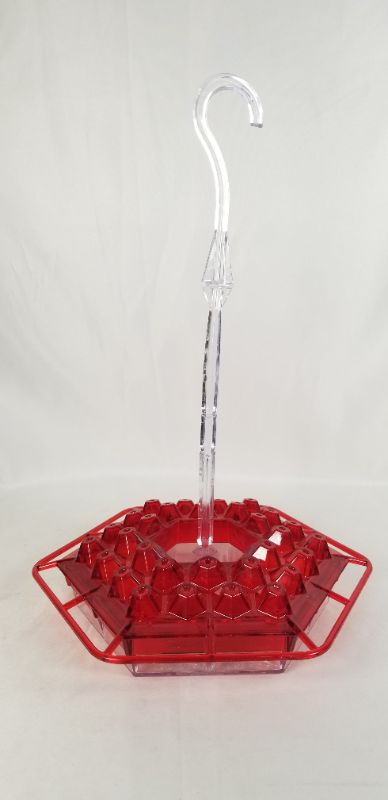 Photo 1 of HUMMINGBIRD OUTDOOR FEEDER HAS 30 FEEDING PORTS IS LEAK PROOF AND EASY TO CLEAN AND FILL NEW 