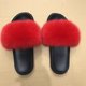 Photo 2 of BLACK SLIDES/SANDLES WITH RED FUZZY POM POM  USED