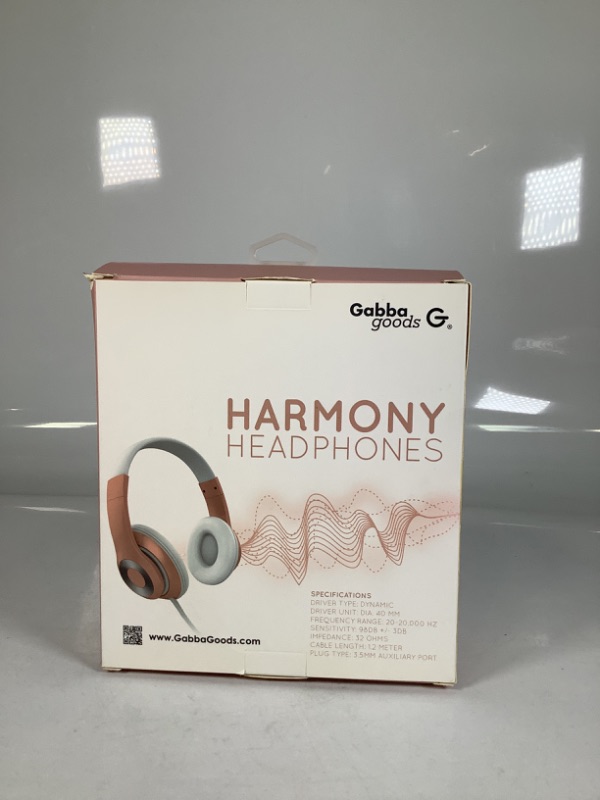 Photo 1 of HARMONY HEADPHONES ULIMITED PLAYTIME WITH AUX CABLE, COLOR PINK AND WHITE NEW