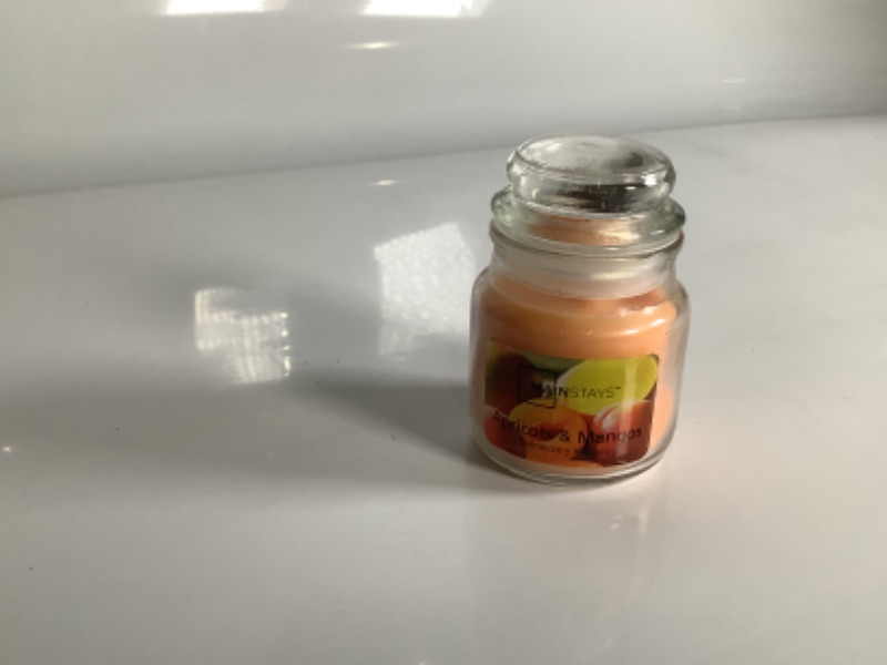 Photo 1 of MAINSTAYS APRICOTS AND MANGOS CANDLE NEW