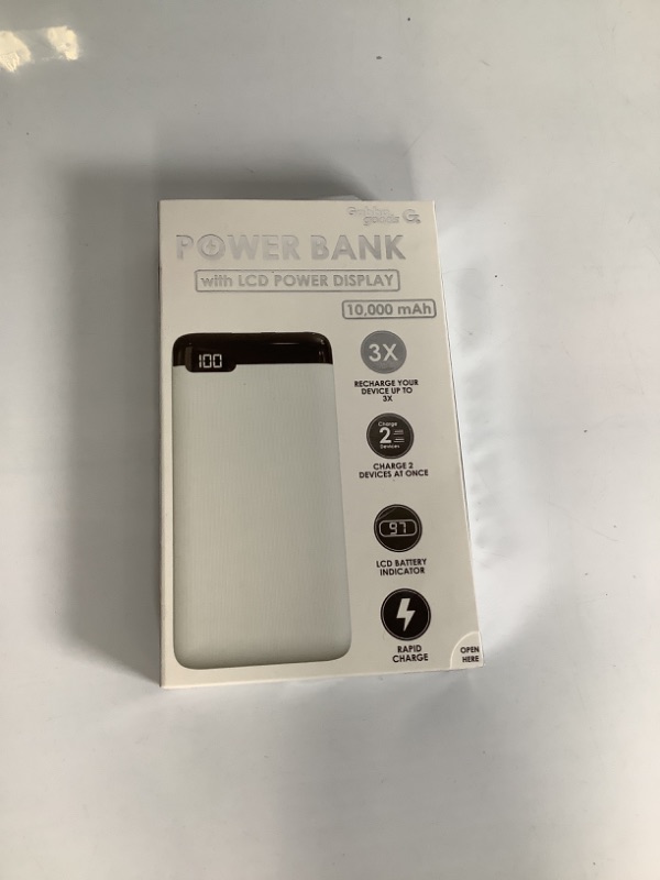 Photo 1 of POWER BANK WITH LCD POWER DISPLAY RECHARGE YOUR DEVICE UP TO 3X CHARGE 2 DEVICE AT ONCE COLOR WHITE AND BLACK  NEW