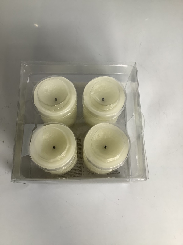 Photo 2 of EXPRESSIONS 4 PACK LED RUSTIC WAX VOTIVES IVORY W/ TIMER BATTERIES INCLUDED NEW