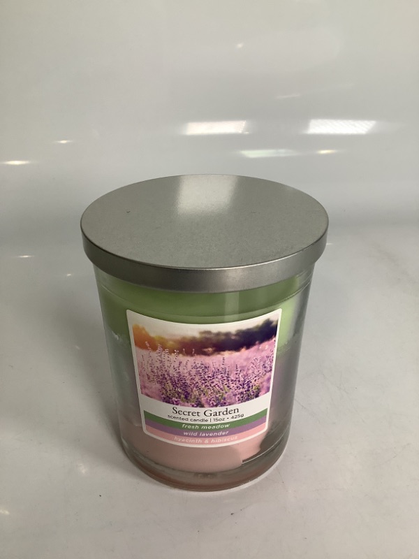 Photo 1 of SECRET GARDEN SCENTED CANDLE NEW