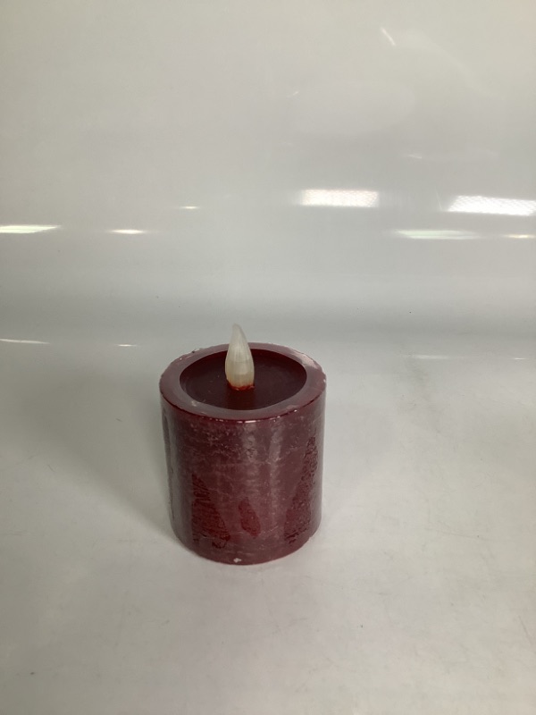 Photo 1 of BURGUNDY LED CANDLE WAX/ PLASTIC BATTERIES NOT INCLUDED 3X3H NEW