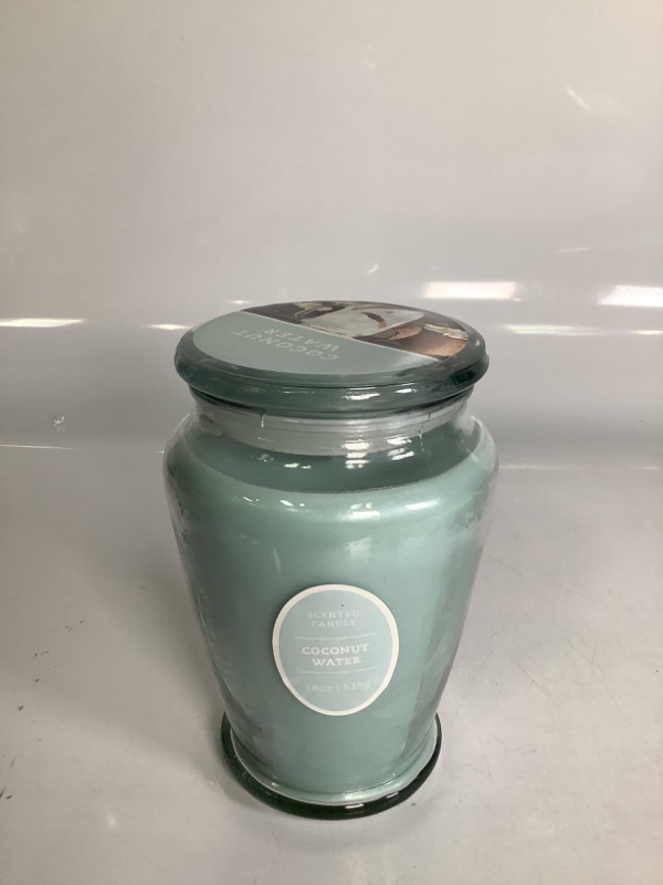 Photo 1 of COCONUT WATER SCENTED CANDLE 18 OZ NEW