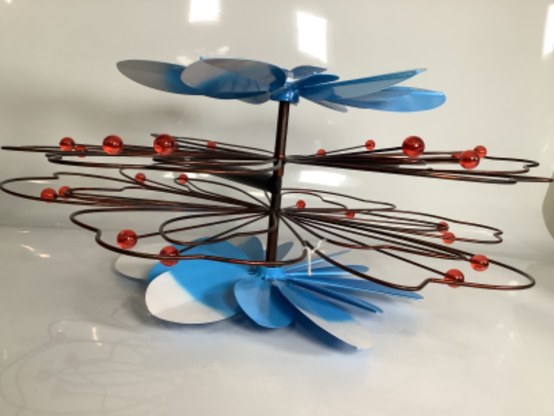 Photo 1 of 75' WIND SPINNER, BLUE FLORAL WITH WIRE DETAILING NEW