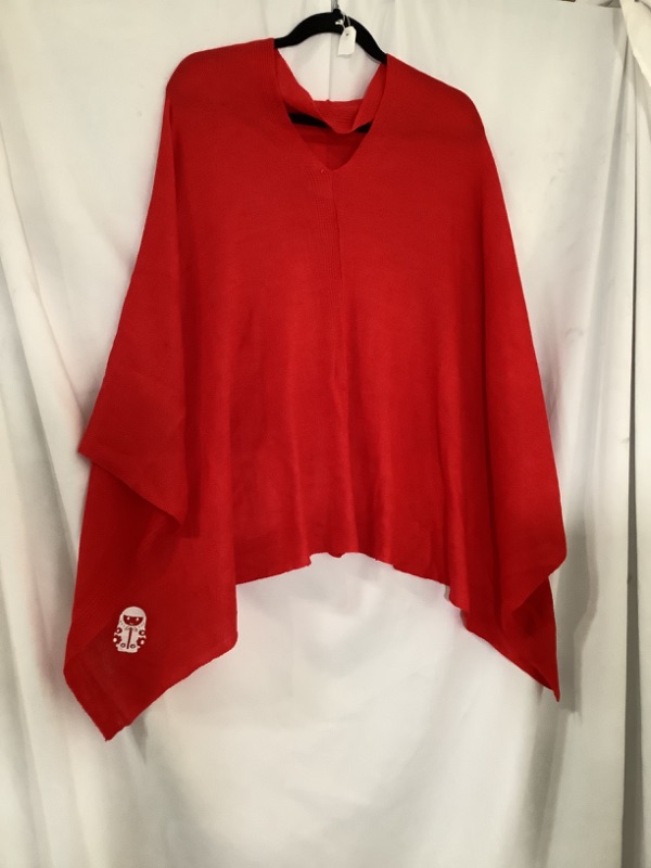 Photo 1 of RED PONCHO WITH WHITE NESTING DOLL NEW