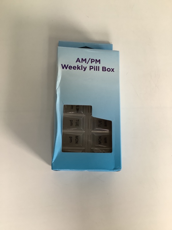 Photo 1 of AM/PM WEEKLY PILL BOX NEW