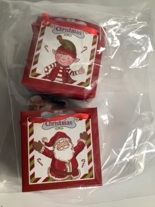 Photo 1 of CHRISMAS BAGS SMALL WITH SANTA INISIDE AND LITTLE BOY NEW