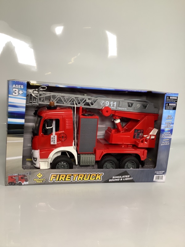 Photo 1 of MEMBERS MARK FIRETRUCK SPRAYS REAL WATER AGES 3 + COLOR RED AND WHITE NEW