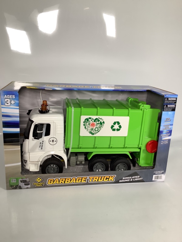 Photo 1 of GARBAGE TRUCK SIMULATED SOUND AND LIGHT COLOR GREEN AND WHITE NEW