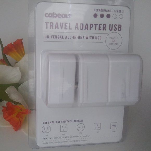 Photo 1 of TRAVEL ADAPTER USB UNIVERSAL ALL IN- ONE WITH USB NEW