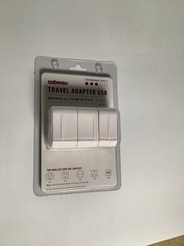 Photo 2 of TRAVEL ADAPTER USB UNIVERSAL ALL IN- ONE WITH USB NEW