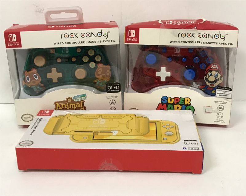 Photo 1 of NINTENDO SWITCH ROCK CANDY CONTROLLERS & NINTENDO HYBRID SYSTEM ARMOR