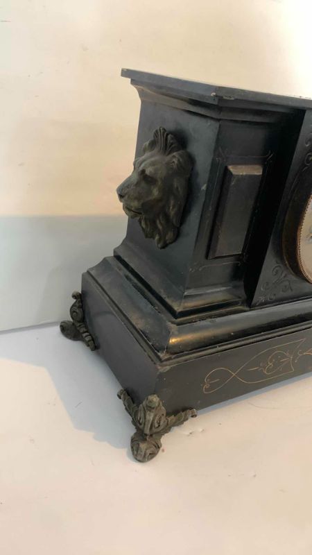 Photo 3 of HEAVY ANTIQUE  BLACK ENAMELED CAST IRON AND BRASS MANTLE CLOCK circa 1882, LION AND GOLD ACCENTS (17” x  8” x H 10.5” )