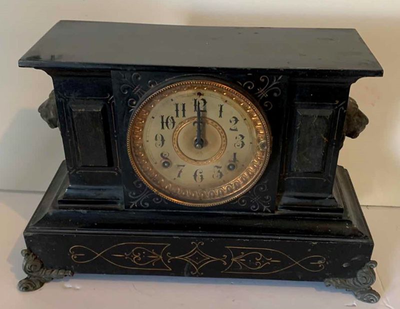 Photo 1 of HEAVY ANTIQUE  BLACK ENAMELED CAST IRON AND BRASS MANTLE CLOCK circa 1882, LION AND GOLD ACCENTS (17” x  8” x H 10.5” )