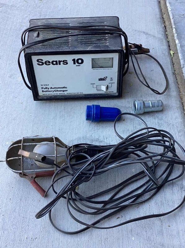 Photo 1 of SEARS AUTO BATTERY CHARGER, TERMINAL CLEANERS, AND LIGHT