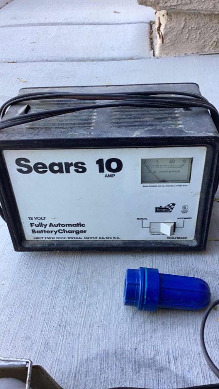 Photo 2 of SEARS AUTO BATTERY CHARGER, TERMINAL CLEANERS, AND LIGHT