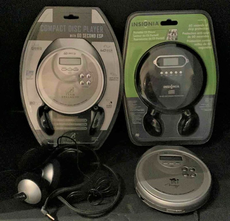 Photo 1 of 3- COMPACT DISC PLAYERS AND TWO EXTRA HEADPHONES