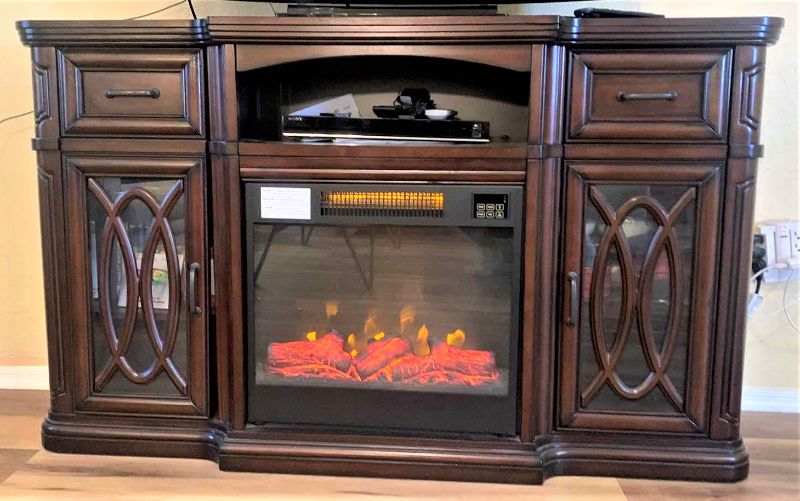 Photo 1 of FIREPLACE  AND ENTERTAINMENT CABINET (CONTENTS, TV NOT INCLUDED) WORKS 60” x 16” x 36”