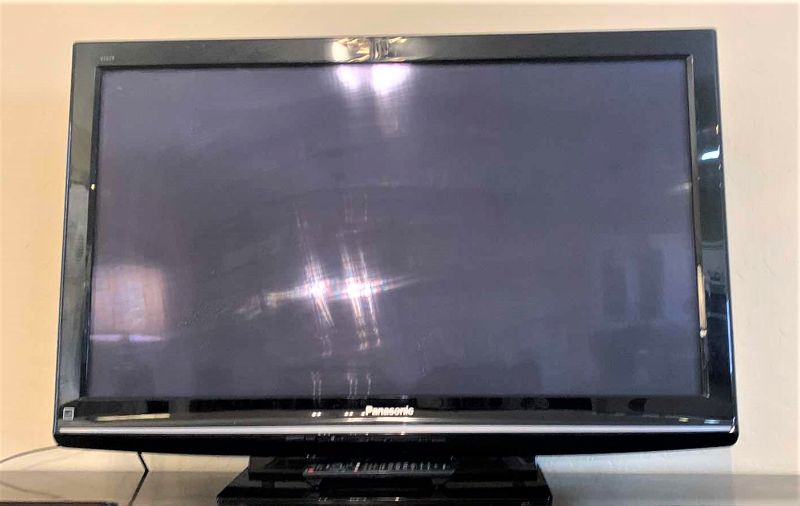 Photo 1 of PANASONIC  42” TV W REMOTE