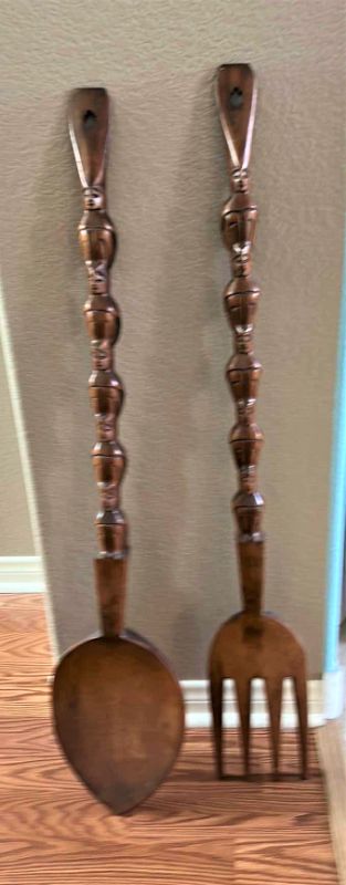 Photo 1 of TWO LARGE WOODEN UTENSILS H41”