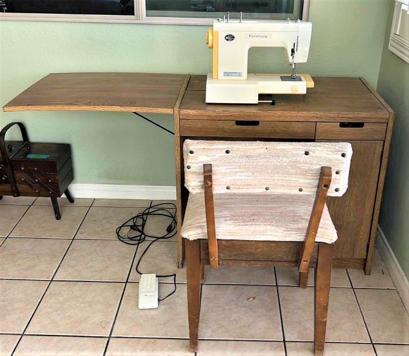 Photo 1 of VINTAGE SEWING TABLE AND CHAIR WITH KENMORE SEWING MACHINE AND ACCESSORIES