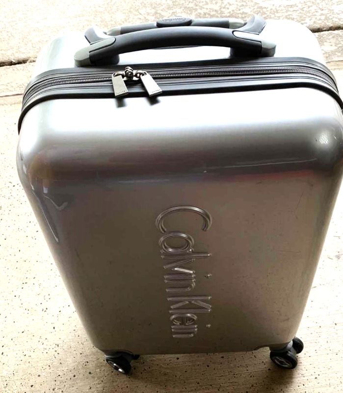 Photo 1 of CALVIN KLEIN HARD SIDE LUGGAGE 22”