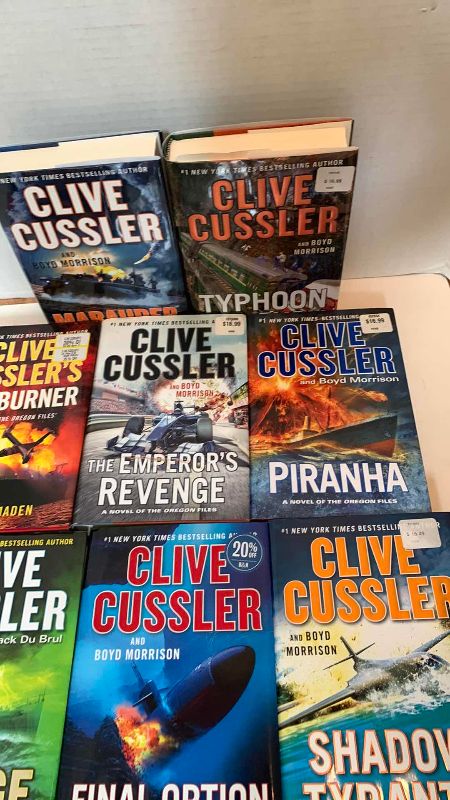 Photo 1 of 8-CLIVE CUSSLER HARD COVER BOOKS