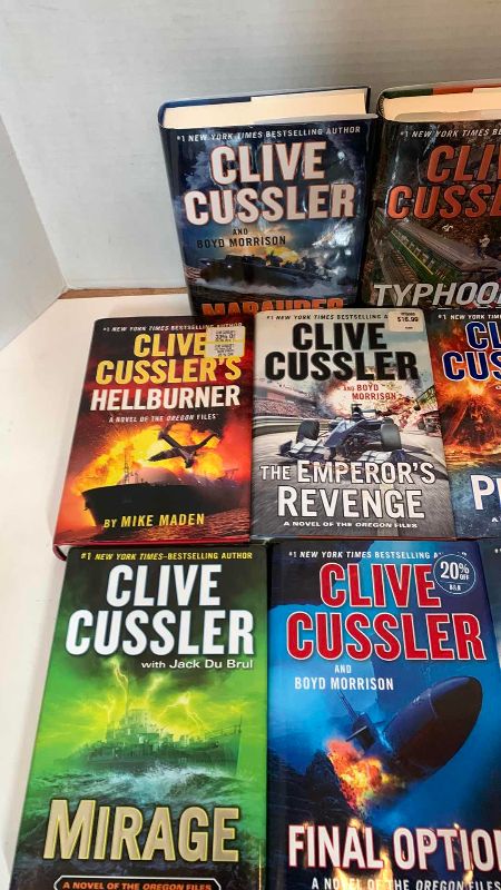 Photo 2 of 8-CLIVE CUSSLER HARD COVER BOOKS