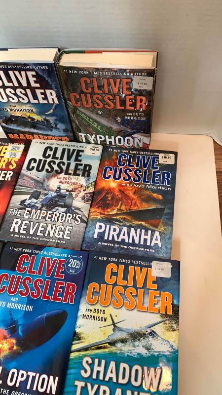 Photo 4 of 8-CLIVE CUSSLER HARD COVER BOOKS