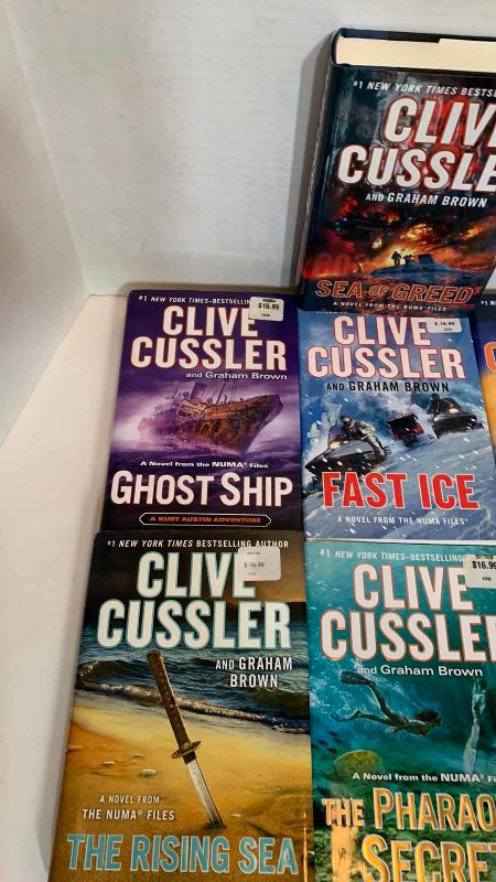 Photo 4 of 7-CLIVE CUSSLER HARD BACK BOOKS