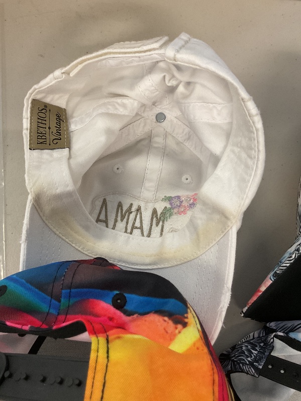 Photo 1 of NEW - 7 CAPS