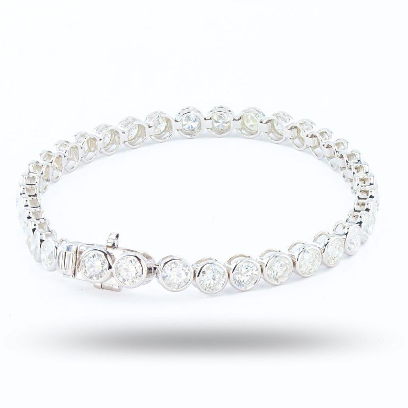 Photo 1 of ORIANNE 8.77ctw G to I COLOR SI3 to I2 CLARITY 14K WHITE GOLD TENNIS BRACELET WEIGHT OF ITEM: 10.7 grams GOLD CONTENT: 14K WHITE GOLD SIZE: 7" WITH APPRAISAL - BR008432

