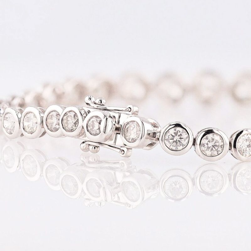 Photo 1 of ORIANNE 8.04ctw G to H COLOR SI1 to I1 CLARITY DIAMOND 14K WHITE GOLD TENNIS BRACELET SIZE 7" GROSS WEIGHT 13.2 Grams WITH APPRAISAL - BR007843
