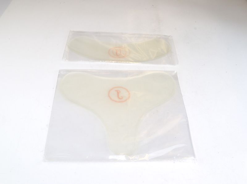 Photo 1 of CHEST AND NECK SMOOTHING PADS STRETCHES SKIN KEEPS IT FIRM IMPROVES IRREGULAR COLLAGEN STRUCTURE INCREASES BLOODFLOW DURABLE AND LONG LASTING SET OF NECK AND CHEST T SHAPE PADS NEW 