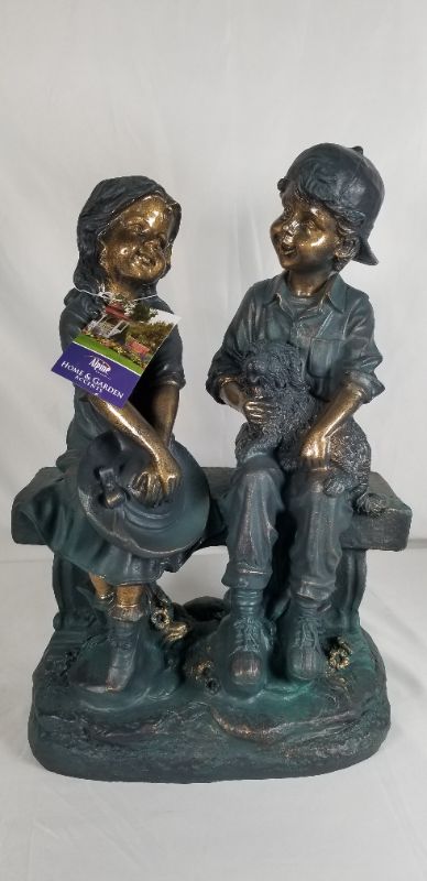 Photo 5 of GIRL AND BOY SITTING ON A BEANCH WITH A PUPPY STAUTE NEW