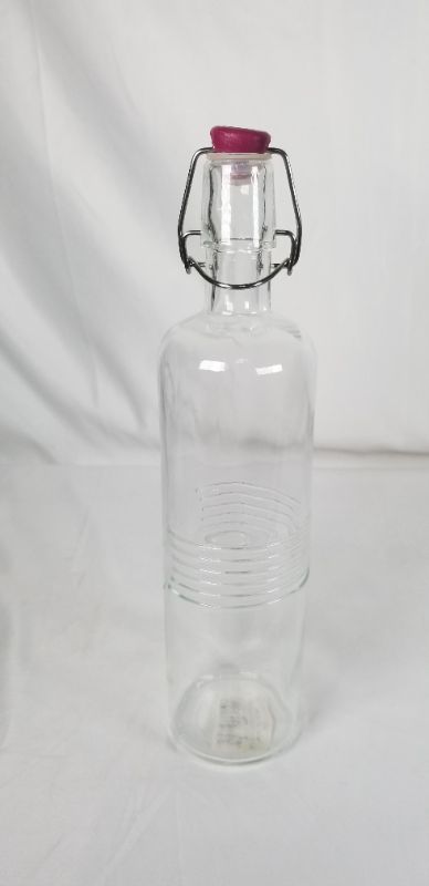 Photo 2 of OLD FASHION CLIP TOP CRUET EMBOSSED CLEAR GLASS 24 OZ NEW