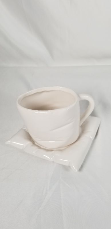 Photo 1 of WHITE CERAMIC CUP AND SAUCER, 3.25 X 3.5 X3H INCHES  CUP, 5 X 5 INCHES SQUARE SAUCER NEW