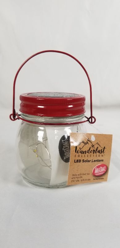 Photo 1 of RED LED SOLAR LANTERN GLASS/METAL/PLASTIC 2.75DX 3.625H INCHES NEW