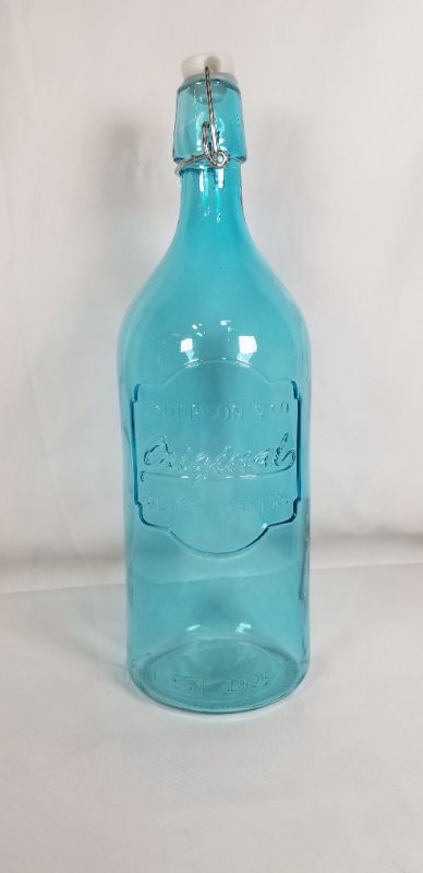 Photo 1 of TURQUOISE GLASS CLIP TOP CRUET EMBOSSED DESIGN 34 OZ NEW