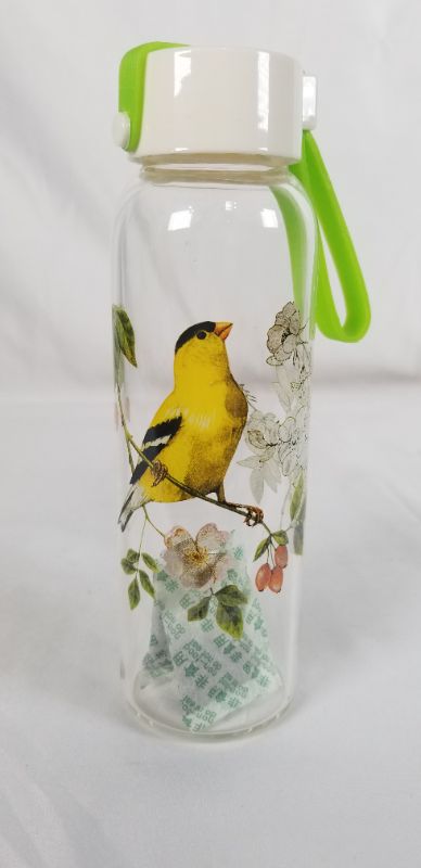 Photo 1 of CLEAR GLASS WATER BOTTLE YELLOW BIRD WITH FLOWERS DESIGN 7.35H INCHES NEW
