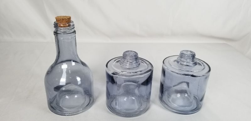 Photo 2 of CLEAR GLASS STACKABLE BOTTLE NEW