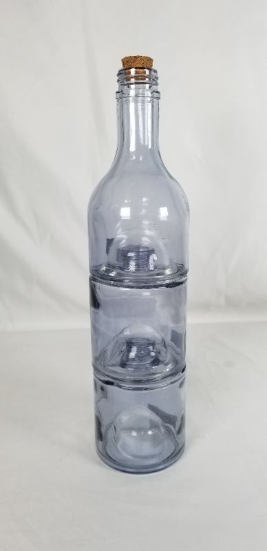 Photo 1 of CLEAR GLASS STACKABLE BOTTLE NEW