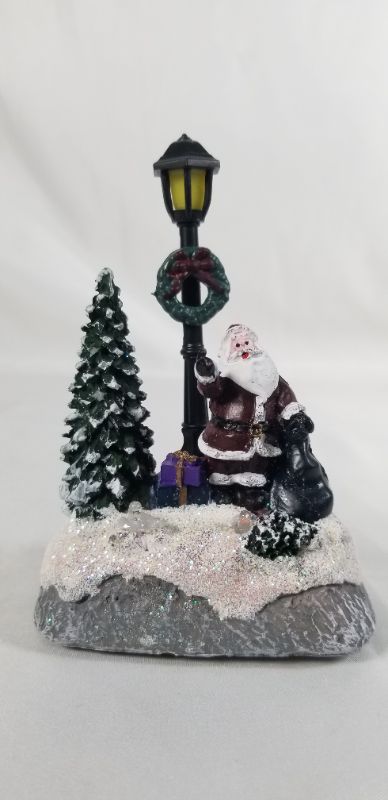 Photo 1 of MINI SANTA CHRISTMAS DECOR WITH LED LIGHTS RESIN 3 X 2 X 5H INCHES NEW
