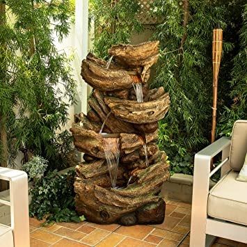 Photo 1 of  5 TIER LOG WATERFALL FOUNTAIN MADE OUT OF RESIN AND STONE POWDER 29 X 22 X 52H INCHES  NEW