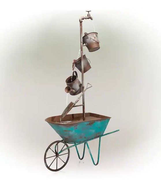 Photo 1 of OUTDOOR RUSTIC WHEELBARROW AND WATERING CAN MULTI TIER METAL FOUNTAIN 31L X 13WX 54H INCHES NEW