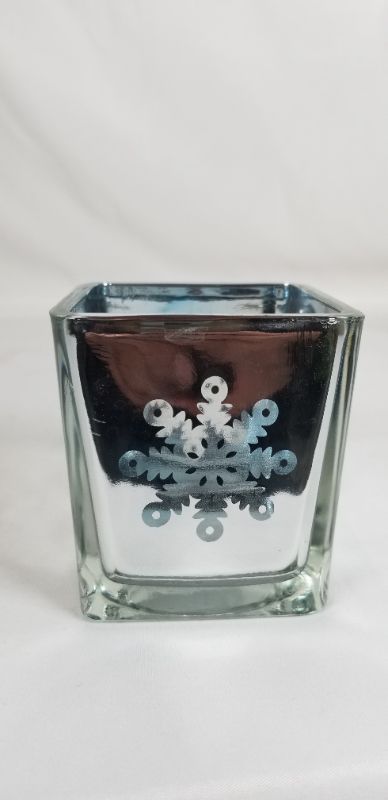 Photo 1 of SILVER SQUARE TEA LIGHT HOLDER WITH SNOWFLAKE DESIGN 2.5 X 2.75.3H INCHES NEW