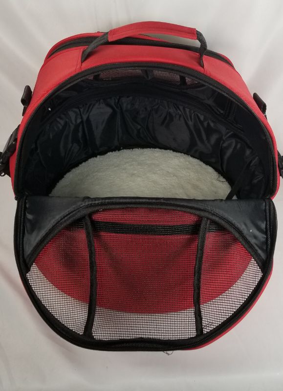 Photo 7 of RED PET CARRIER WITH BED BOTH SIDE AND TOP OPENS USED 