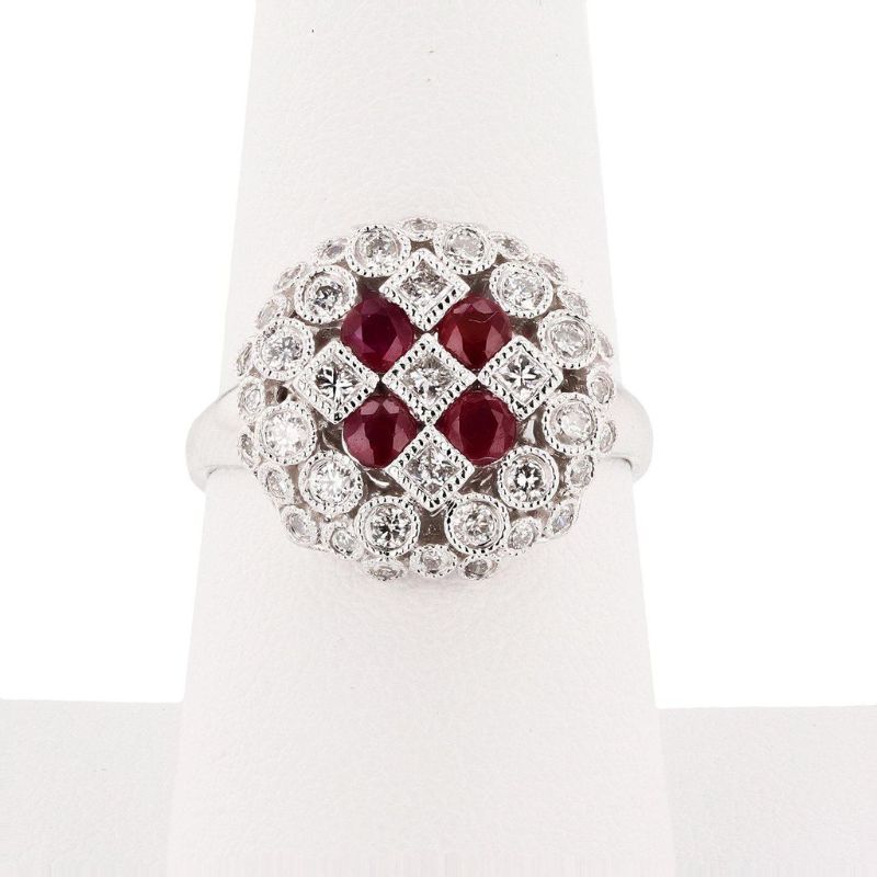 Photo 1 of ORIANNE PLATINUM  CUSTOM  DIAMOND & RUBY RING.  0.70 ctw DIAMOND AND 0.66 RUBY, TOTAL WEIGHT OF RING 8.0g  SIZE 7 1/2 WITH APPRAISAL RN027203